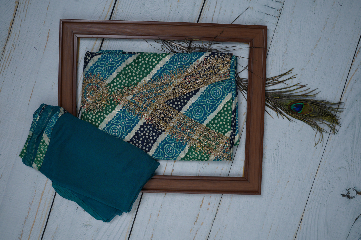 Blue and Green in This Unstitched Dress Material Suit