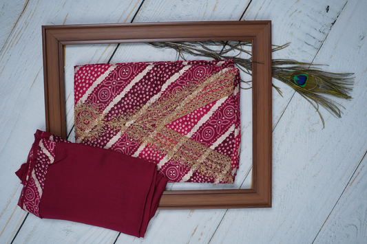 Dark Magenta in This Unstitched Dress Material Suit