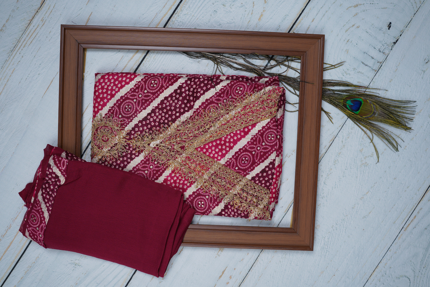 Dark Magenta in This Unstitched Dress Material Suit