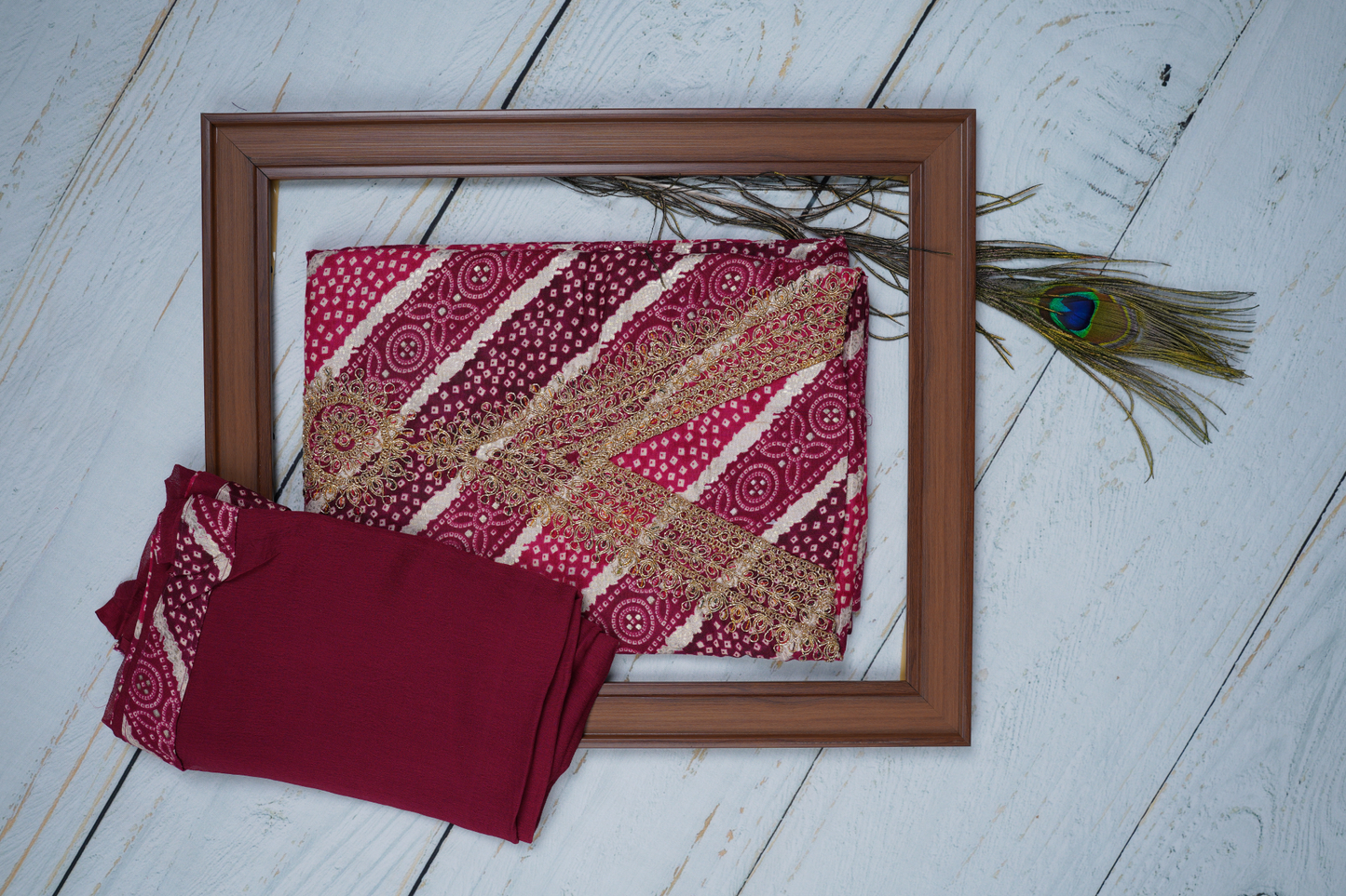 Dark Magenta in This Unstitched Dress Material Suit