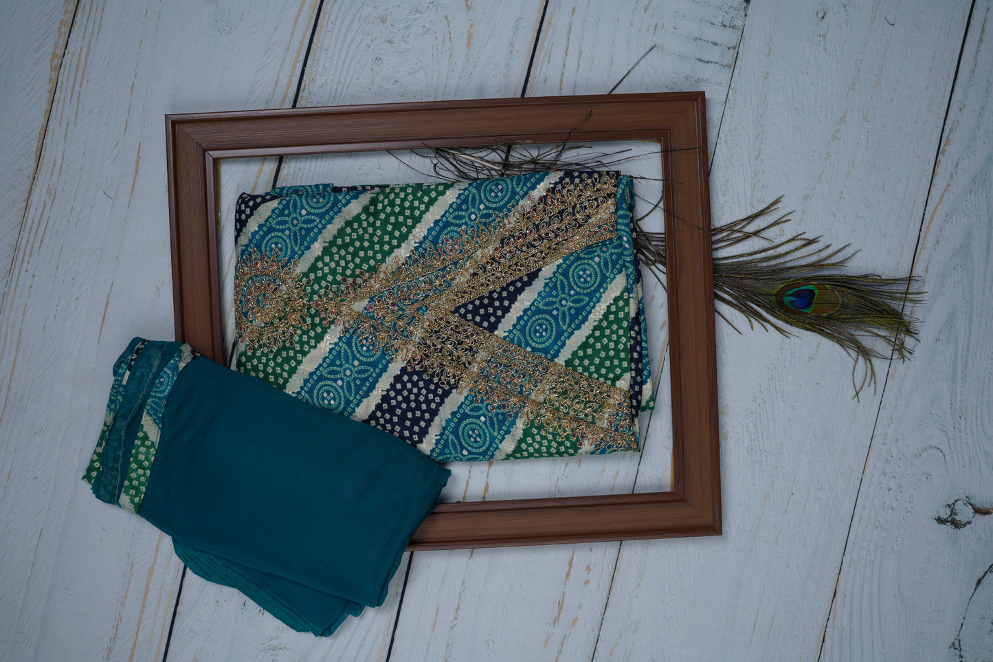 Blue and Green in This Unstitched Dress Material Suit