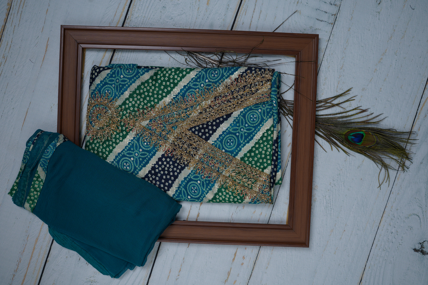 Blue and Green in This Unstitched Dress Material Suit