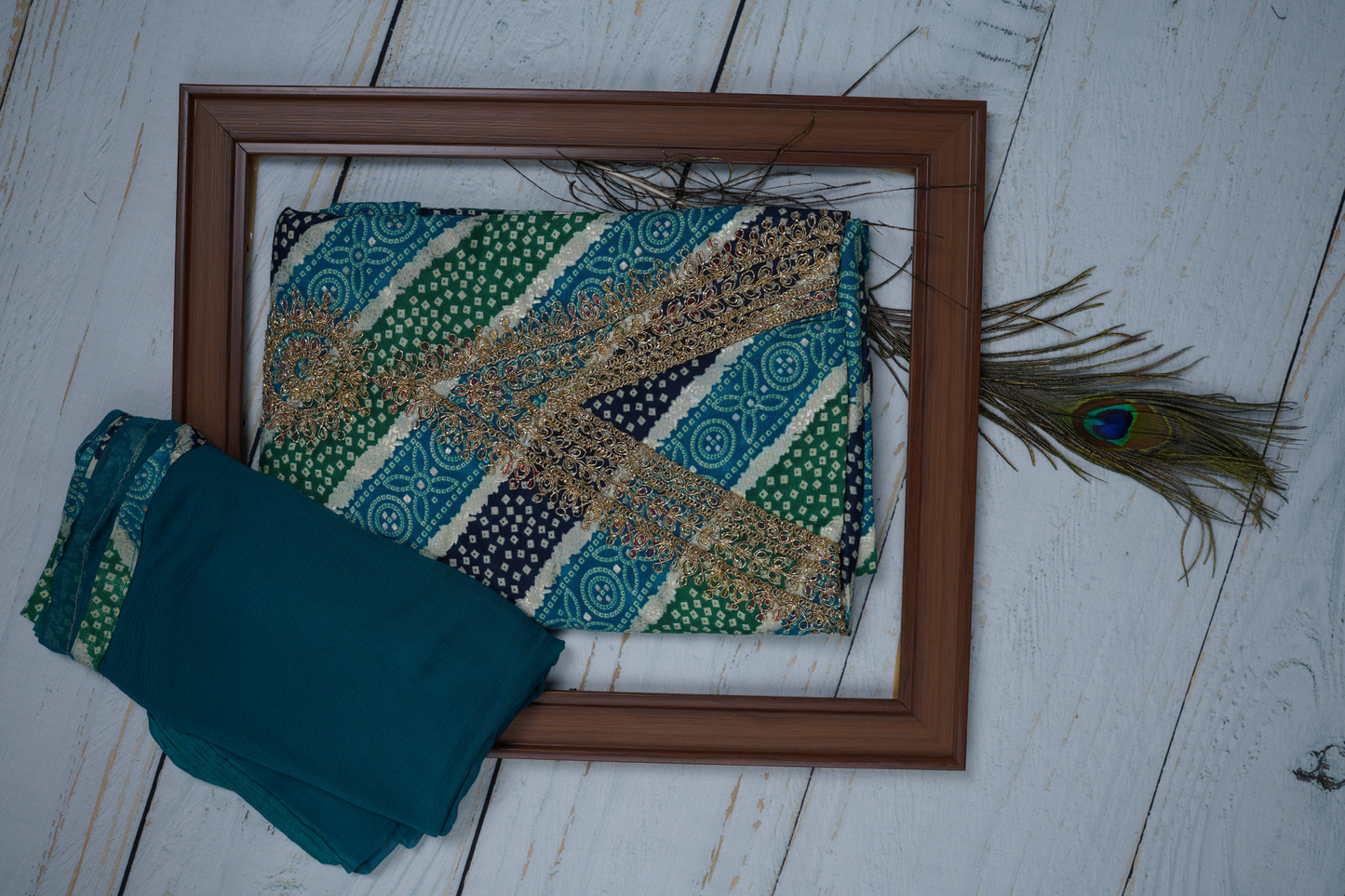 Blue and Green in This Unstitched Dress Material Suit